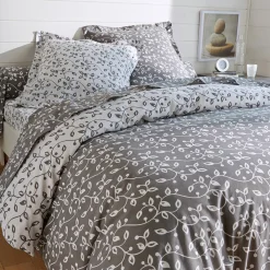 Bedlinnen Héritage in flanel met krulmotieven<br>