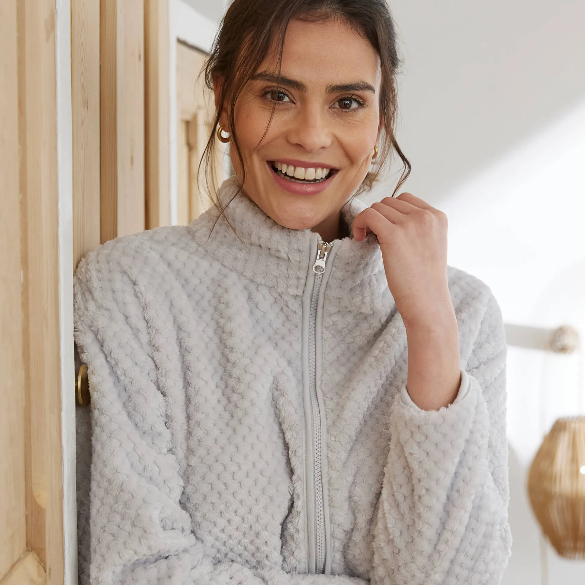 Binnenhuisjasje in fleecetricot met rits
