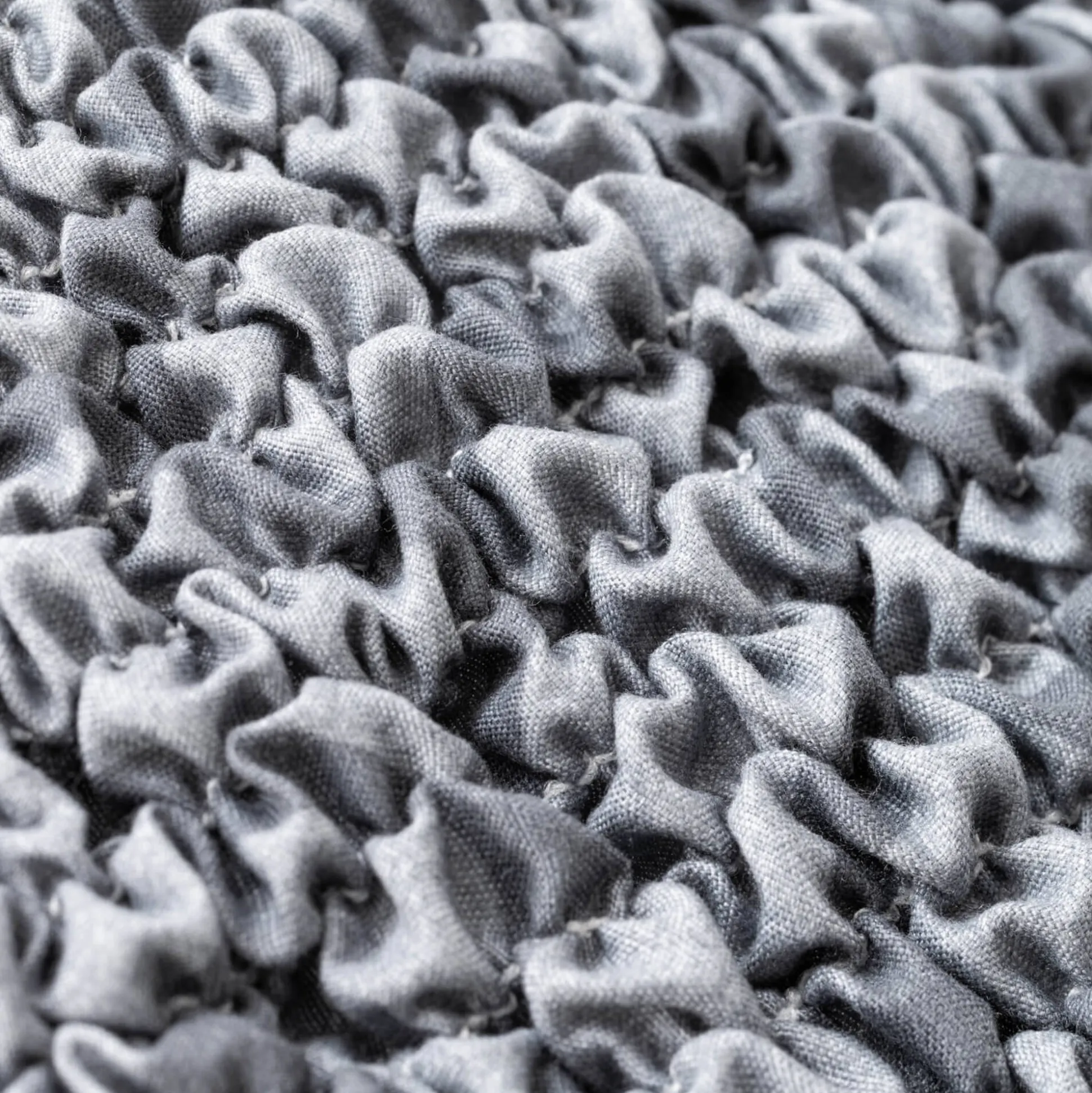Bi-rekbare, grafische hoes in gewafelde microvezel voor fauteuil en zetel