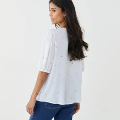Bloes in crepon met goudkleurige print