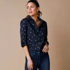 Bloes met goudkleurige print