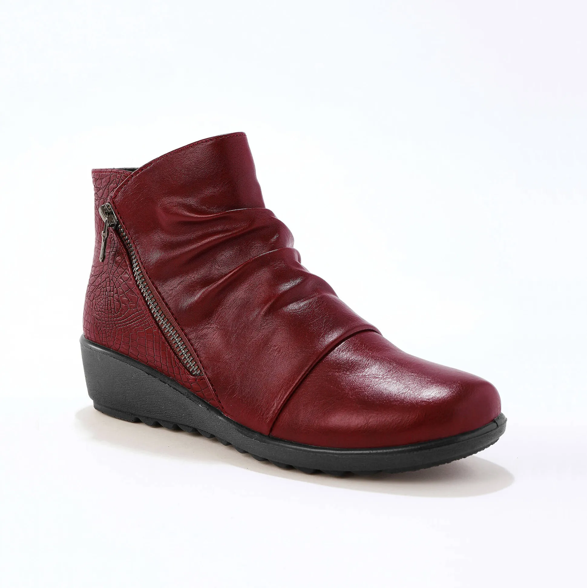 Boots met sleehak en rits, getextureerd effect achter