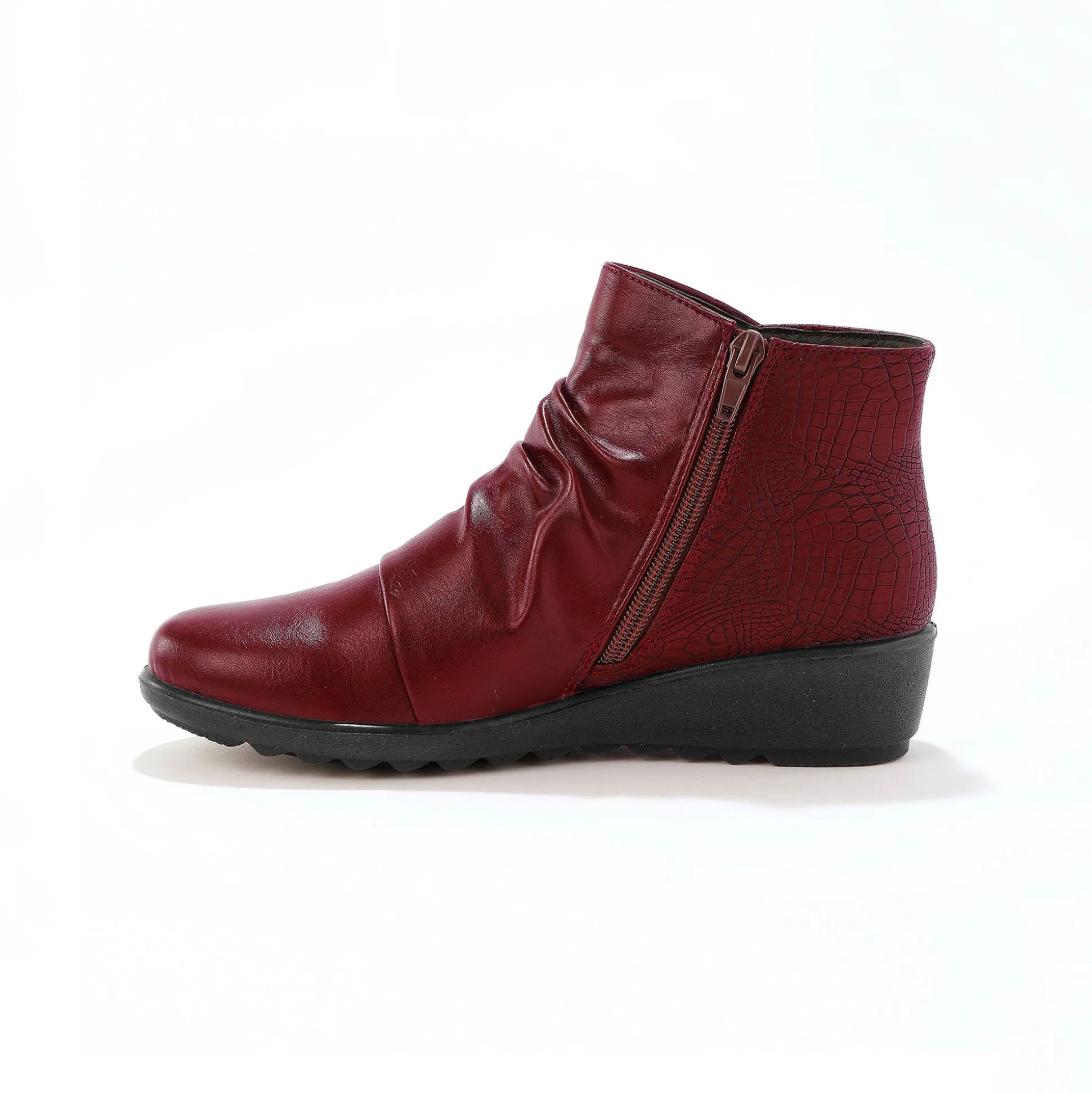 Boots met sleehak en rits, getextureerd effect achter