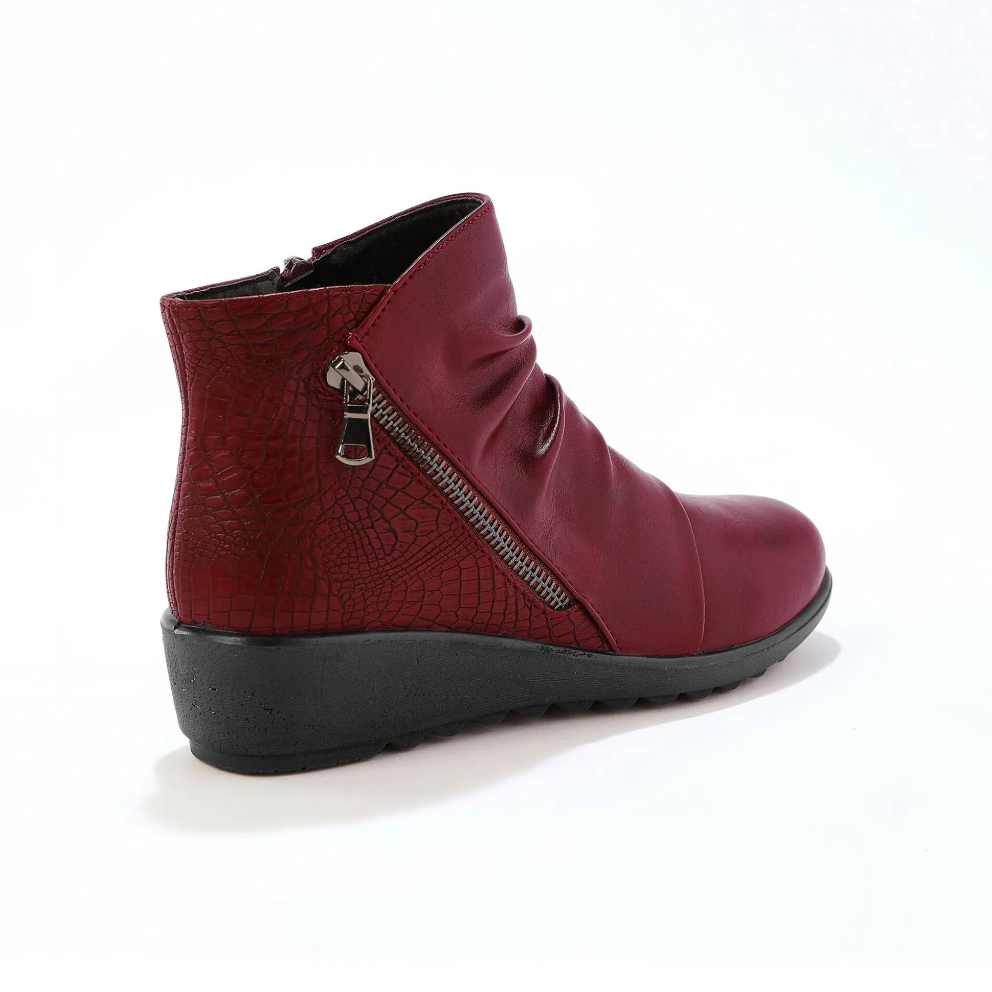 Boots met sleehak en rits, getextureerd effect achter