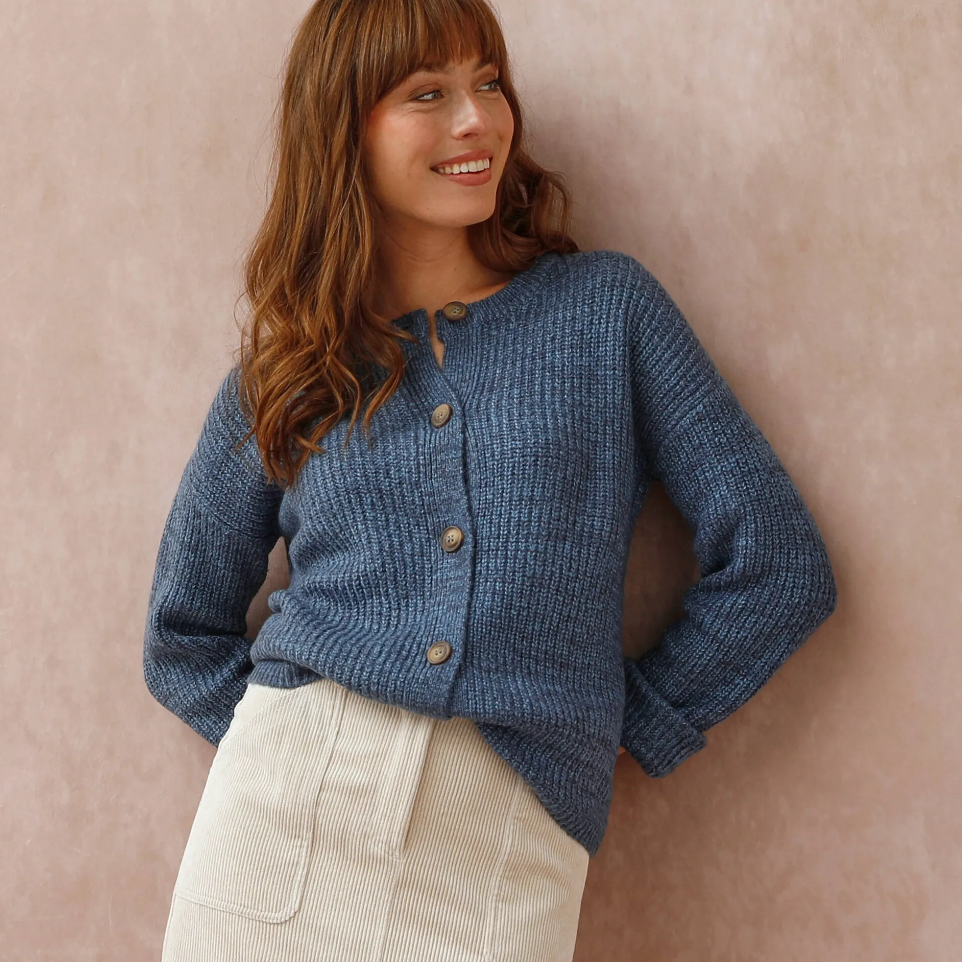 Cardigan in patenttricot met knoopsluiting en lange mouwen