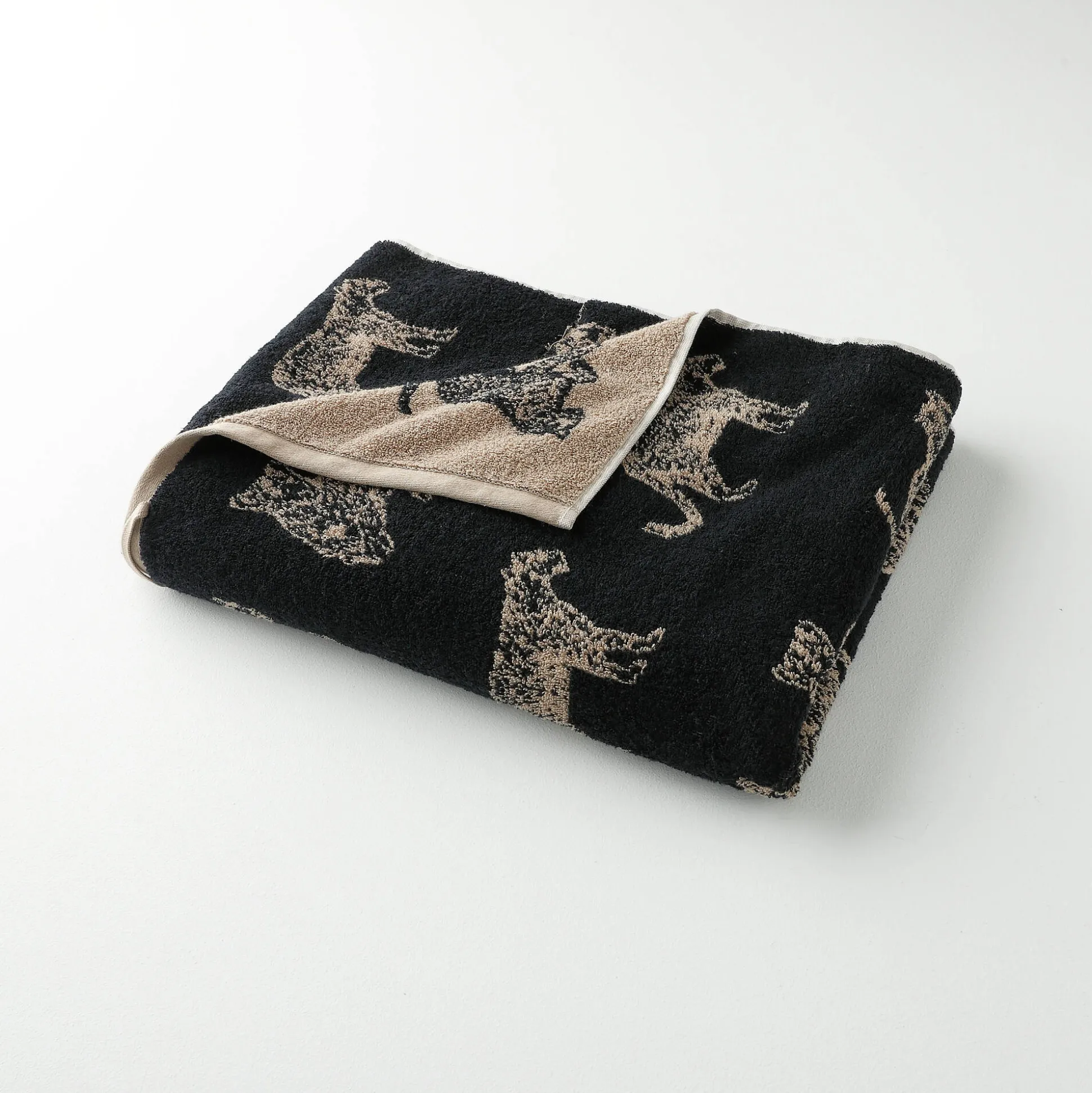 Collectie handdoeken in jacquard met luipaardmotief 450 g/m2