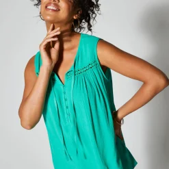 Effen, mouwloze tuniek, crepon en macramé