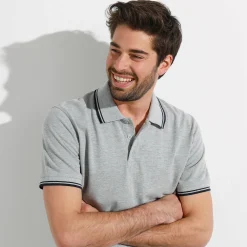 Effen polo in piquétricot met korte mouwen