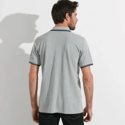 Effen polo in piquétricot met korte mouwen