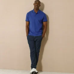 Effen polo in piquétricot met korte mouwen