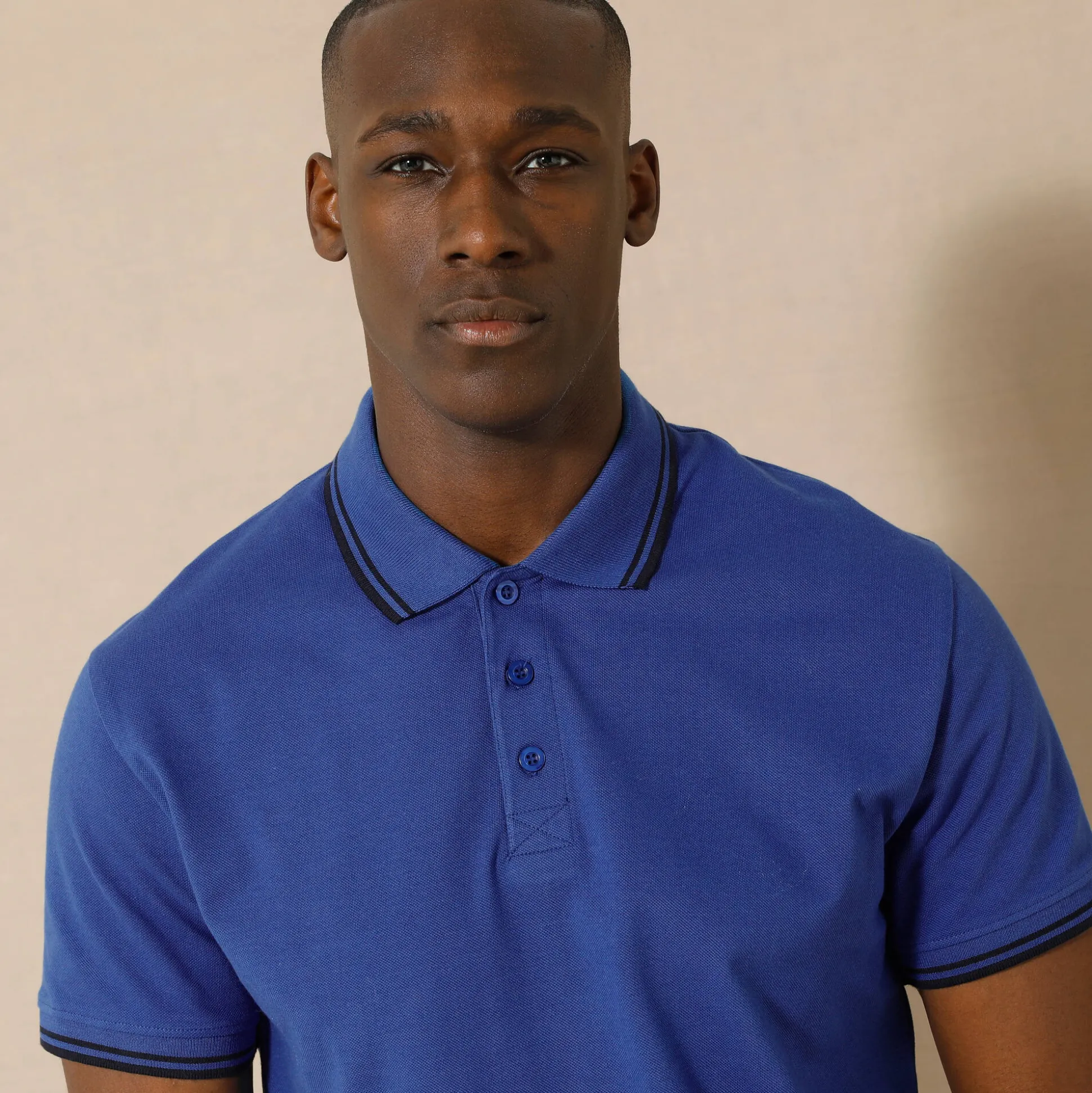 Effen polo in piquétricot met korte mouwen
