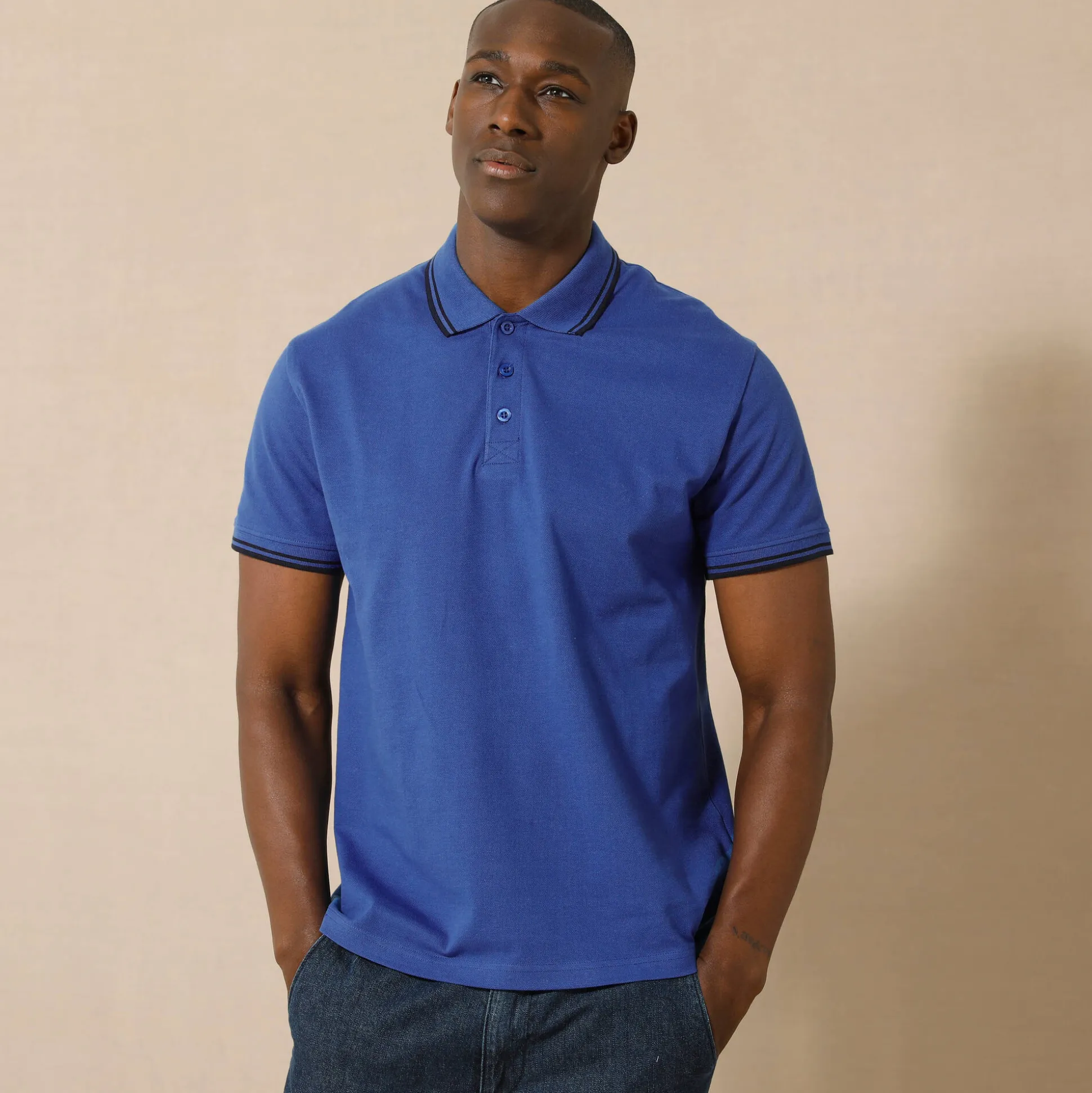 Effen polo in piquétricot met korte mouwen