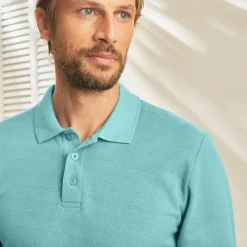Effen polo in piquétricot met lange mouwen