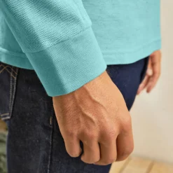 Effen polo in piquétricot met lange mouwen