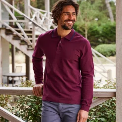 Effen polo in piquétricot met lange mouwen