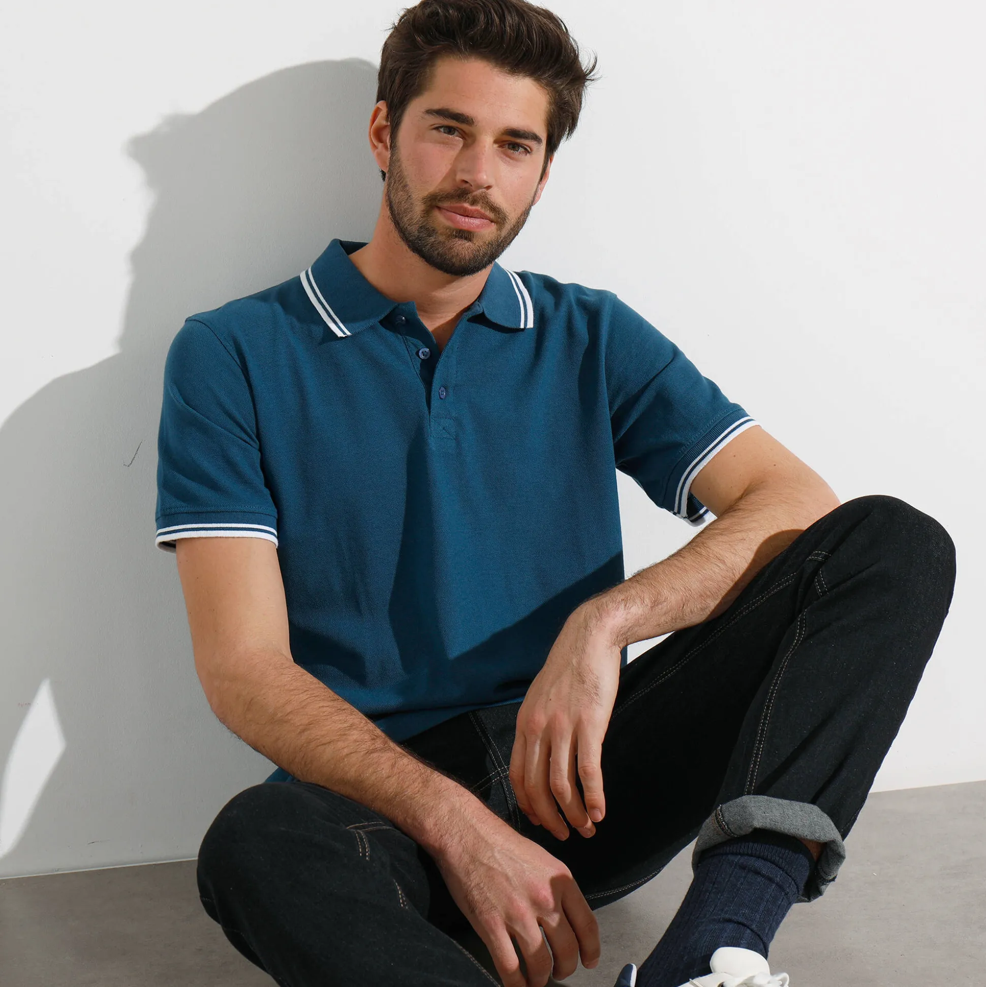 Effen polo in piquétricot met korte mouwen