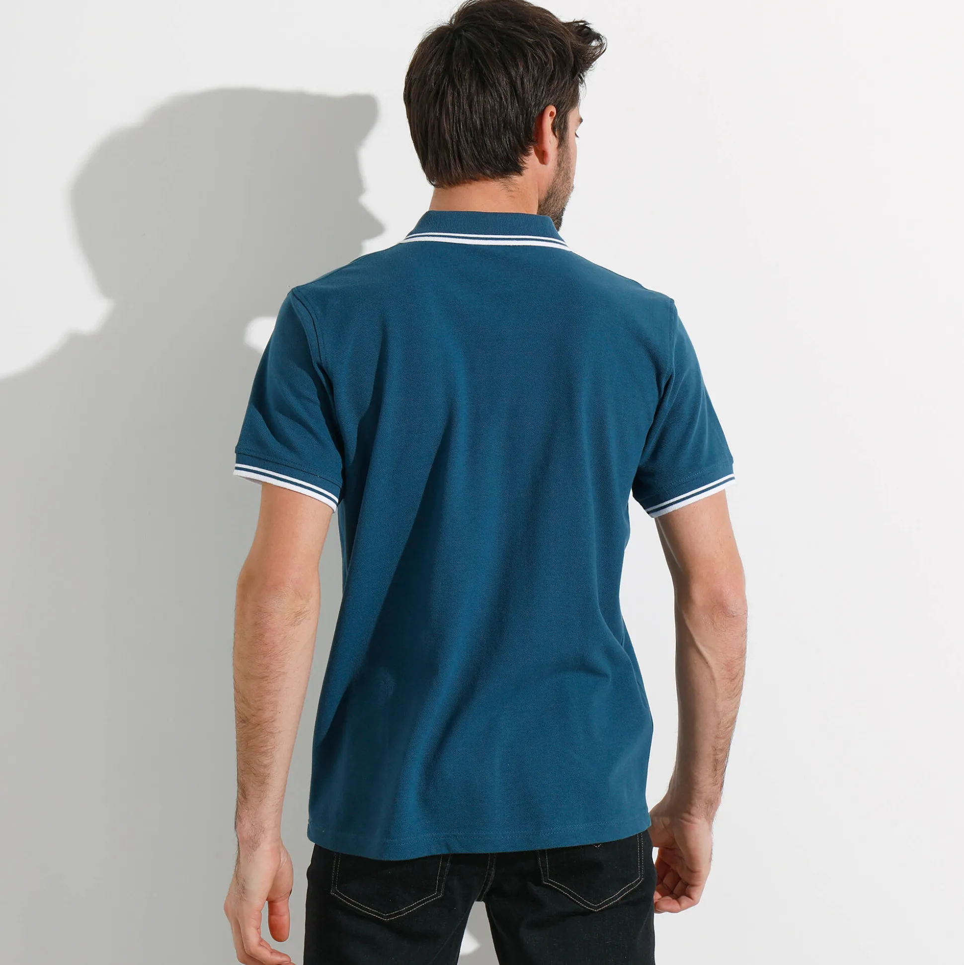 Effen polo in piquétricot met korte mouwen