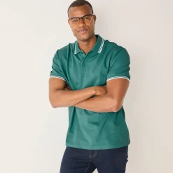 Effen polo in piquétricot met korte mouwen