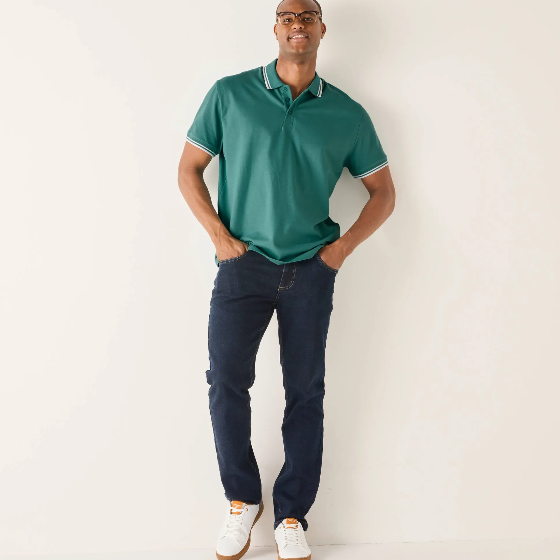 Effen polo in piquétricot met korte mouwen