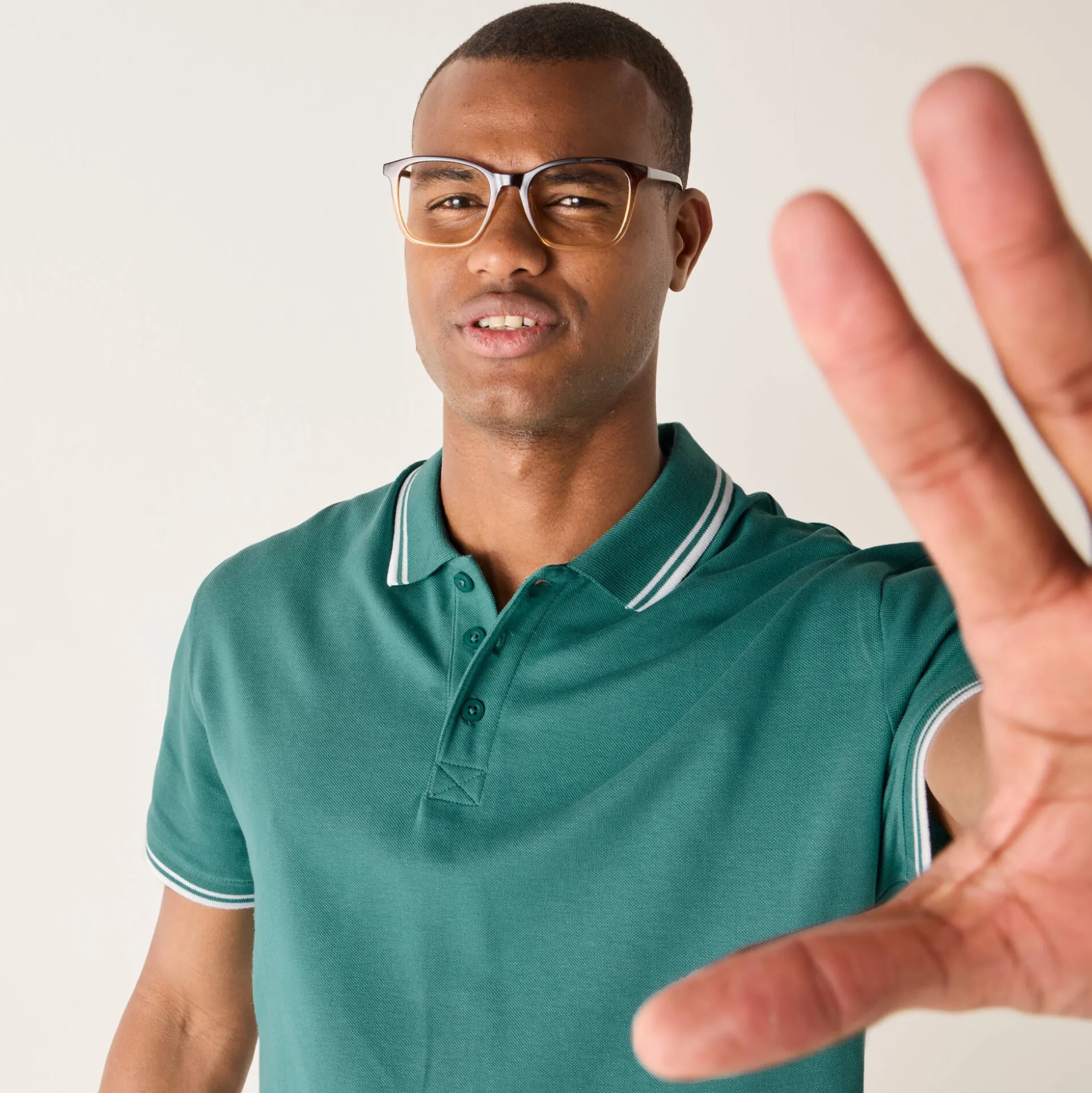 Effen polo in piquétricot met korte mouwen