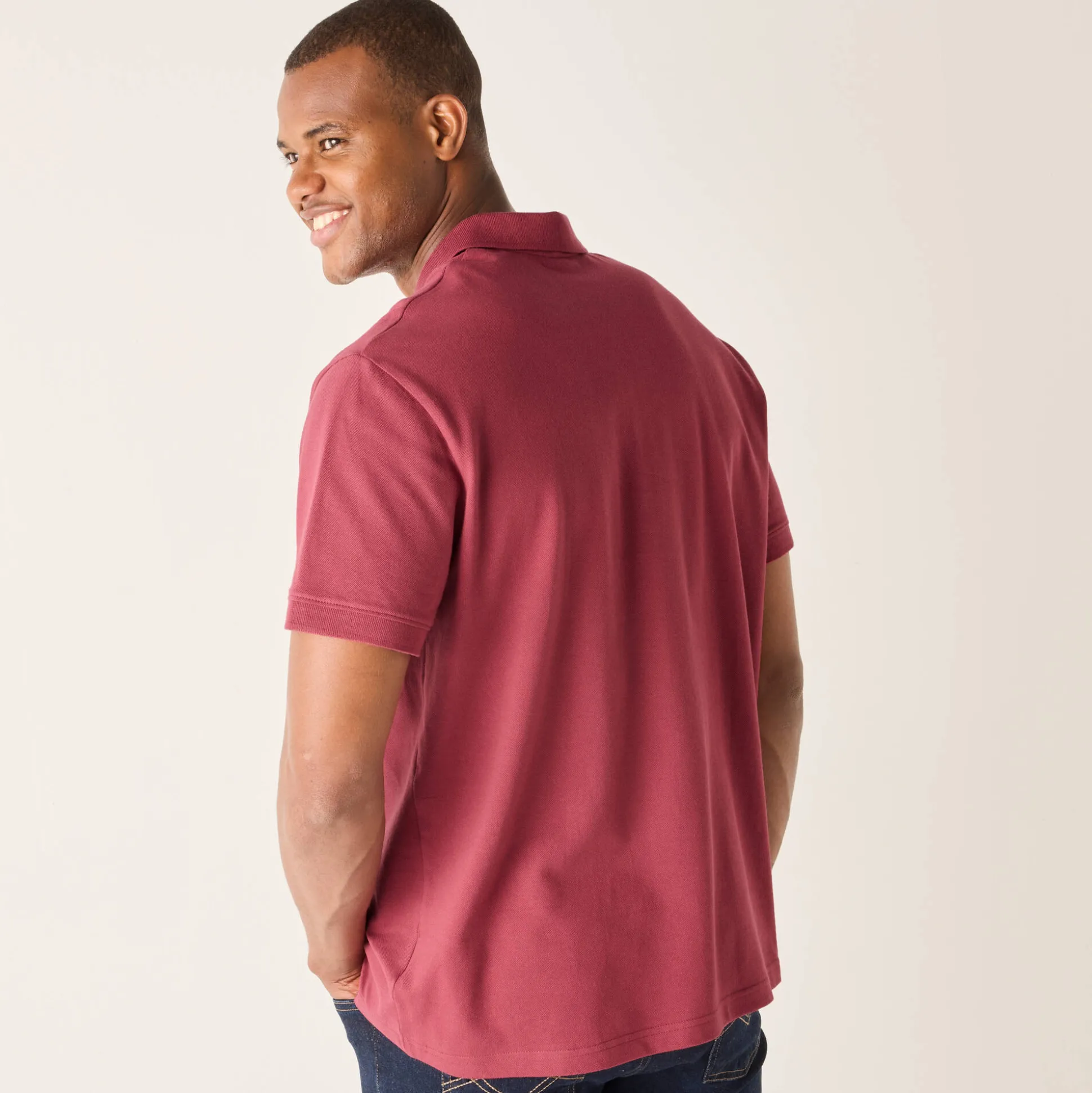 Effen polo in piquétricot met korte mouwen