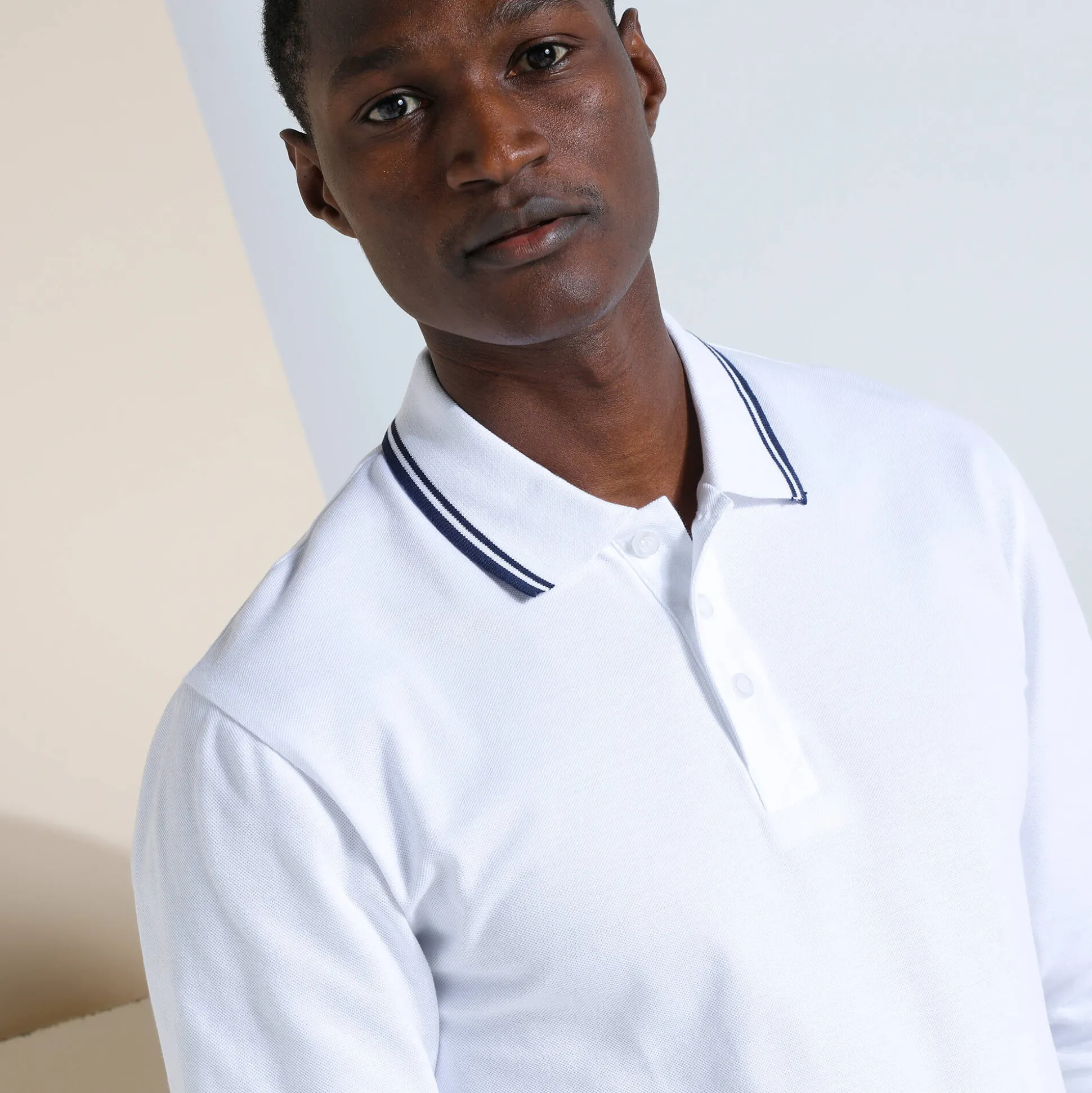 Effen polo in piquétricot met lange mouwen