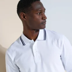 Effen polo in piquétricot met lange mouwen