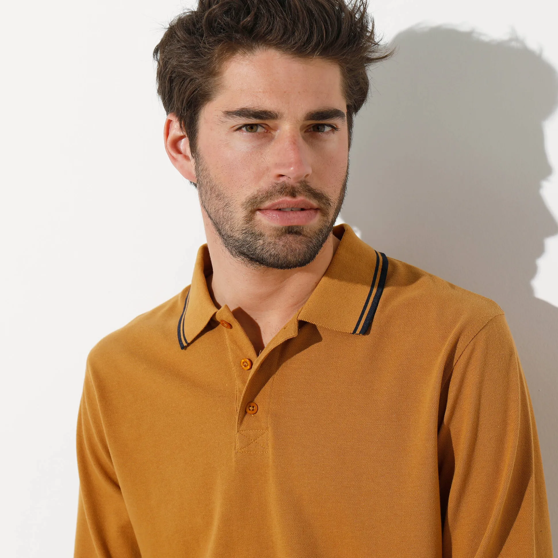 Effen polo in piquétricot met lange mouwen