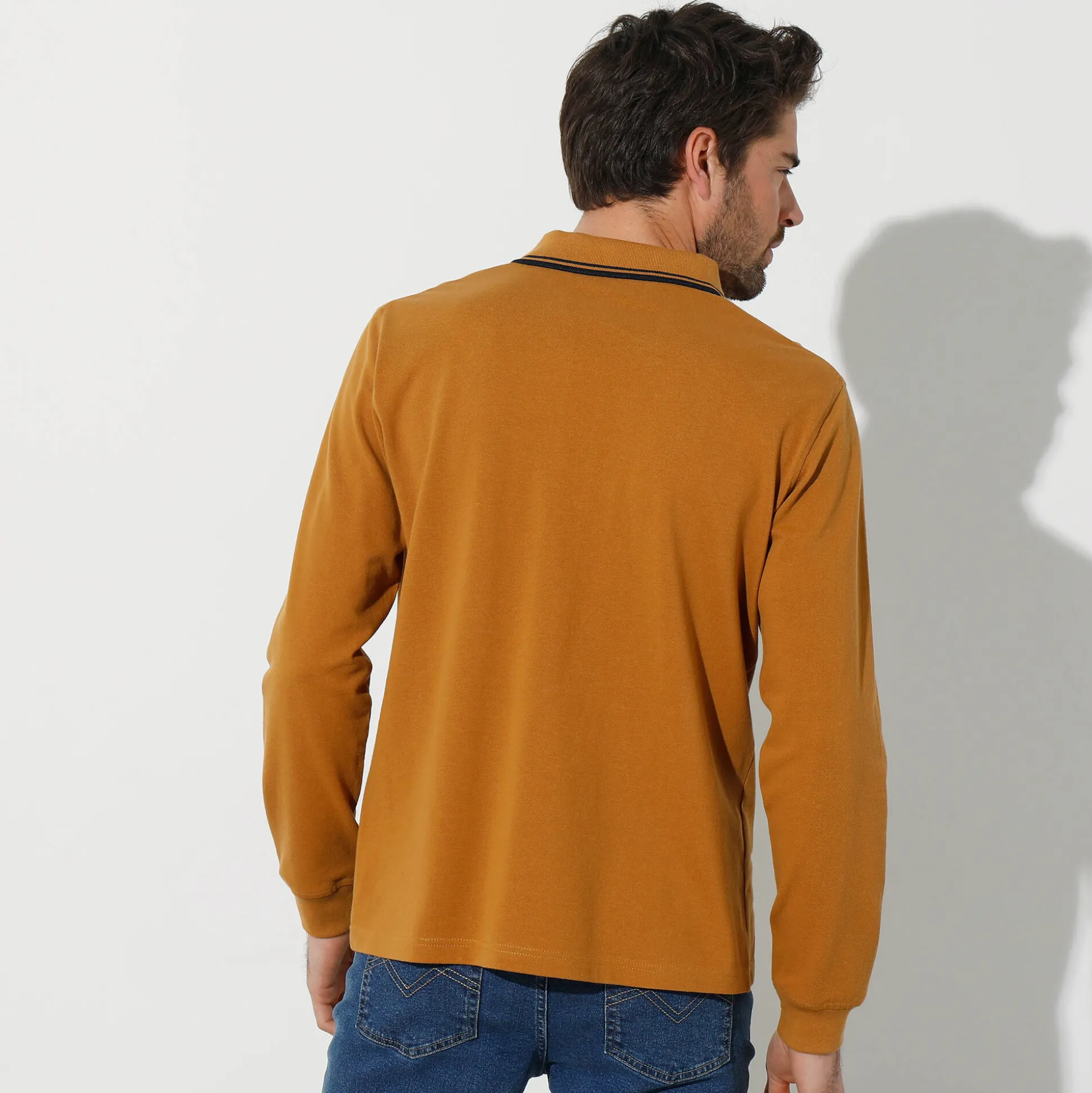 Effen polo in piquétricot met lange mouwen