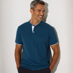 Effen polo in piquétricot, met maokraagje en korte mouwen