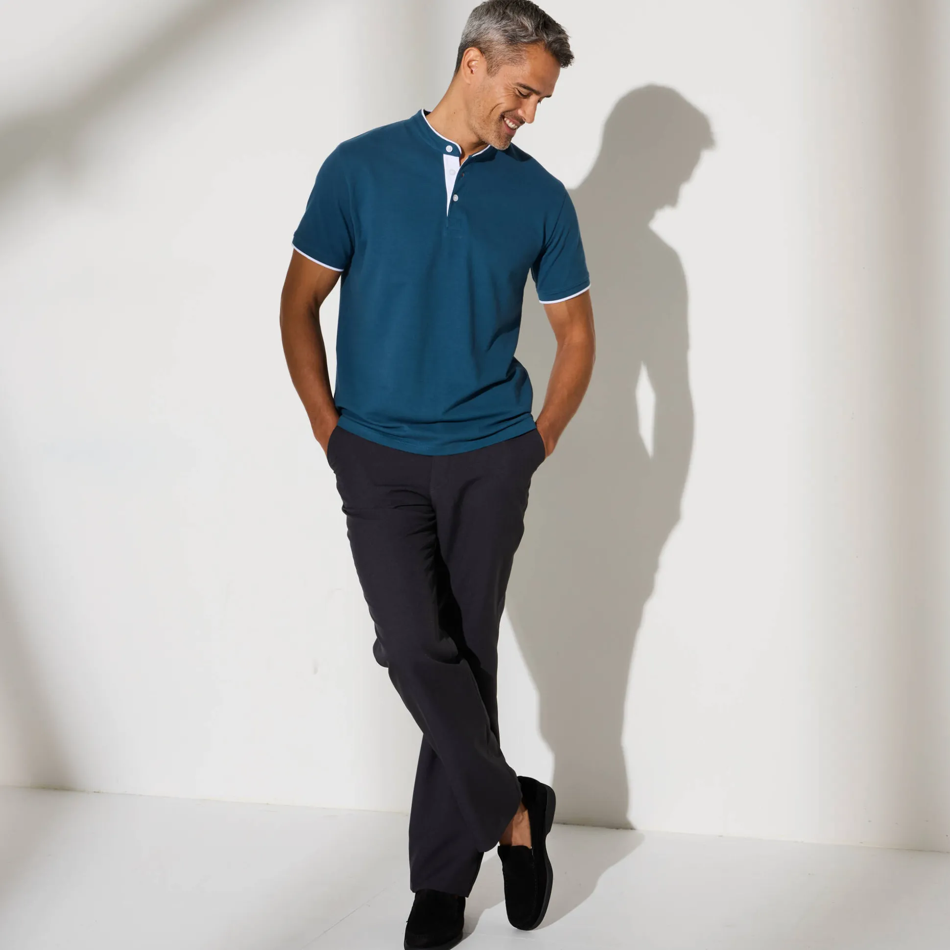 Effen polo in piquétricot, met maokraagje en korte mouwen