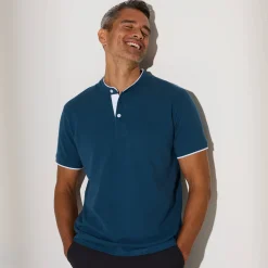 Effen polo in piquétricot, met maokraagje en korte mouwen