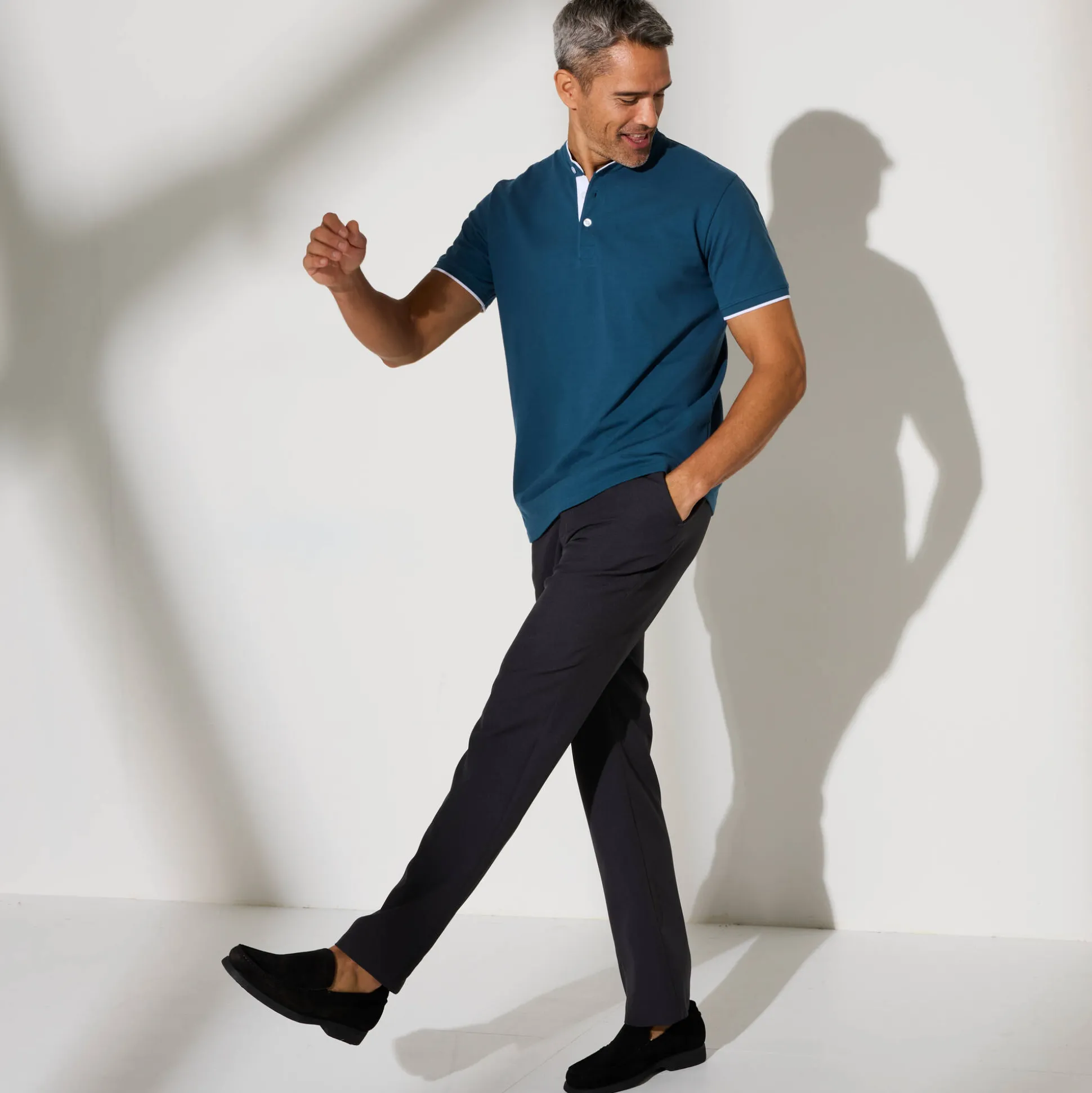 Effen polo in piquétricot, met maokraagje en korte mouwen