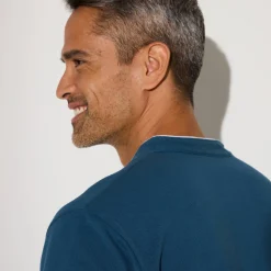 Effen polo in piquétricot, met maokraagje en korte mouwen