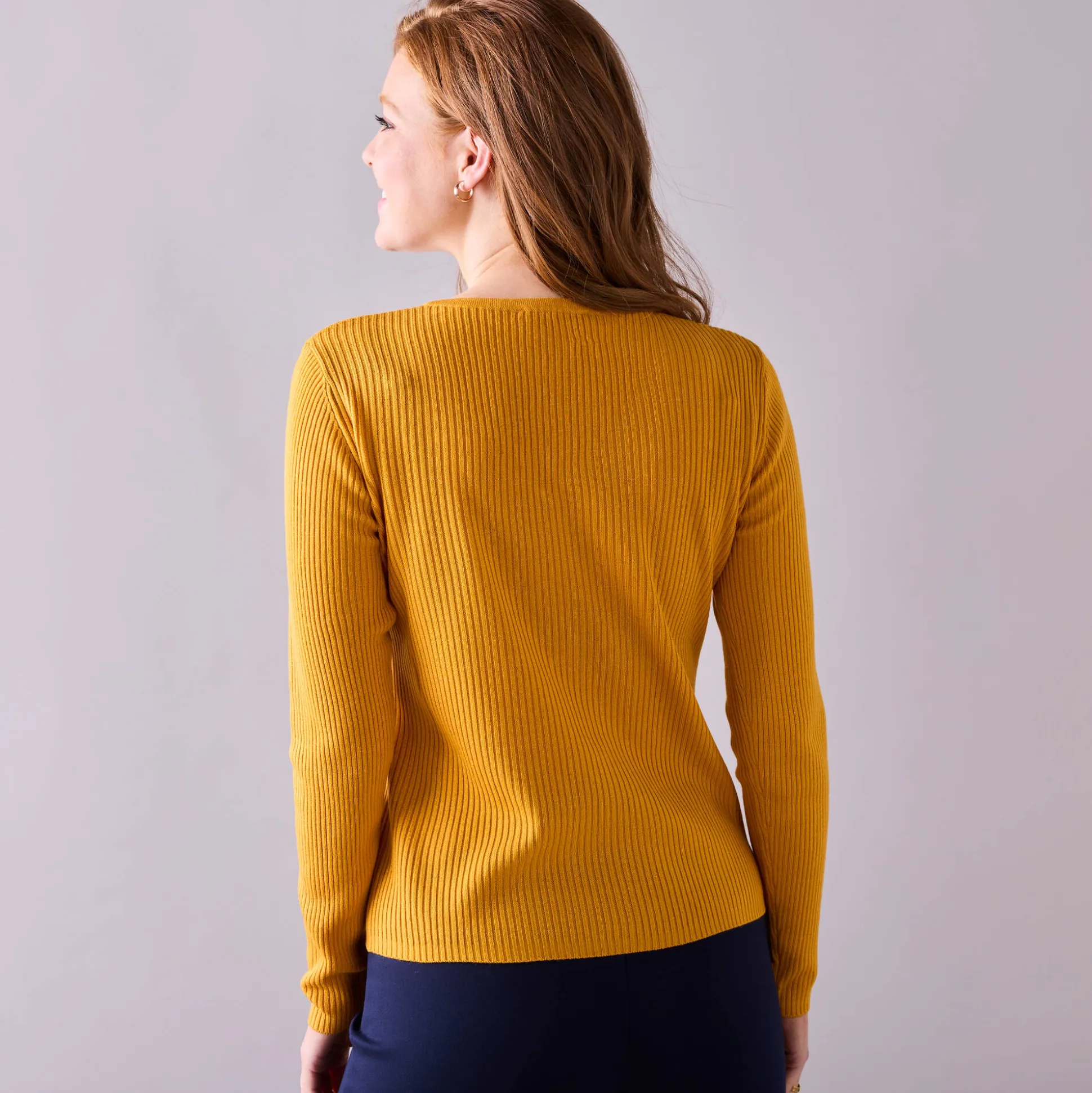 Effen trui in ribbeltricot met V-hals