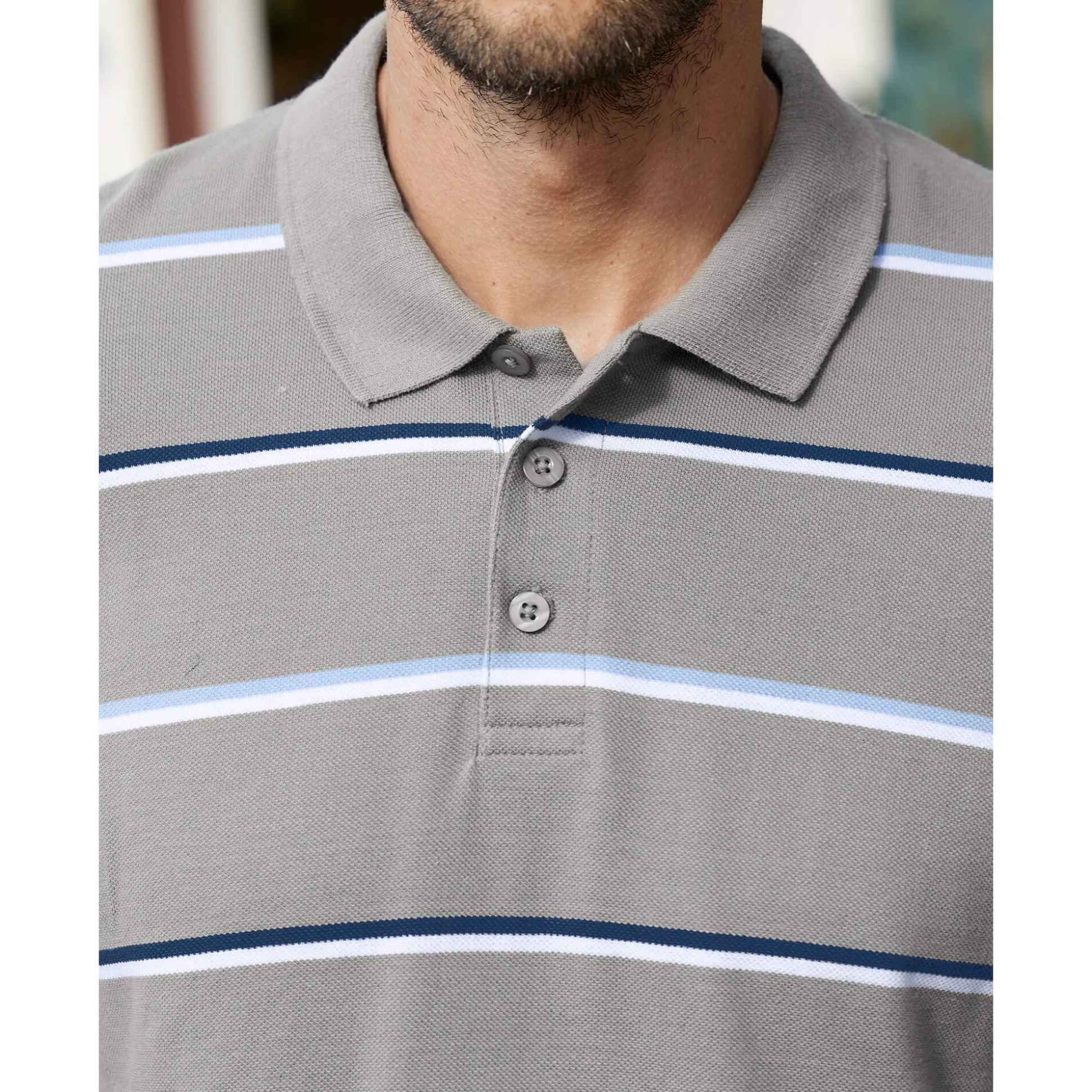 Gestreepte polo in chiné piquétricot met lange mouwen