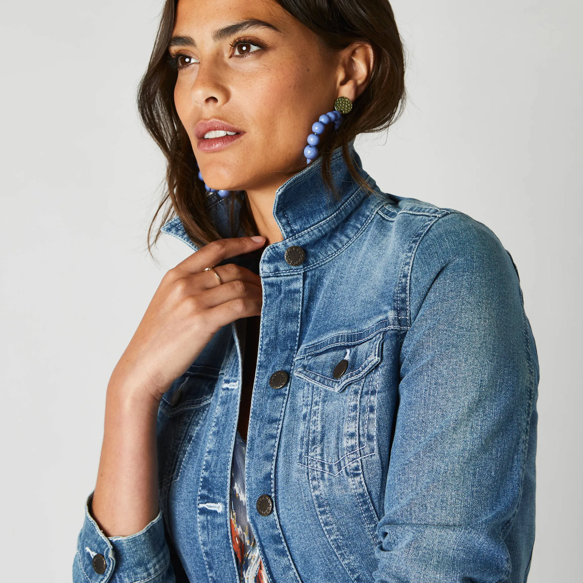 Jasje in jeans met borduursel