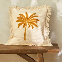 Kussen met geborduurd palmboommotief
