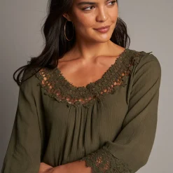 Lange tuniek met macramé en 3/4-mouwen