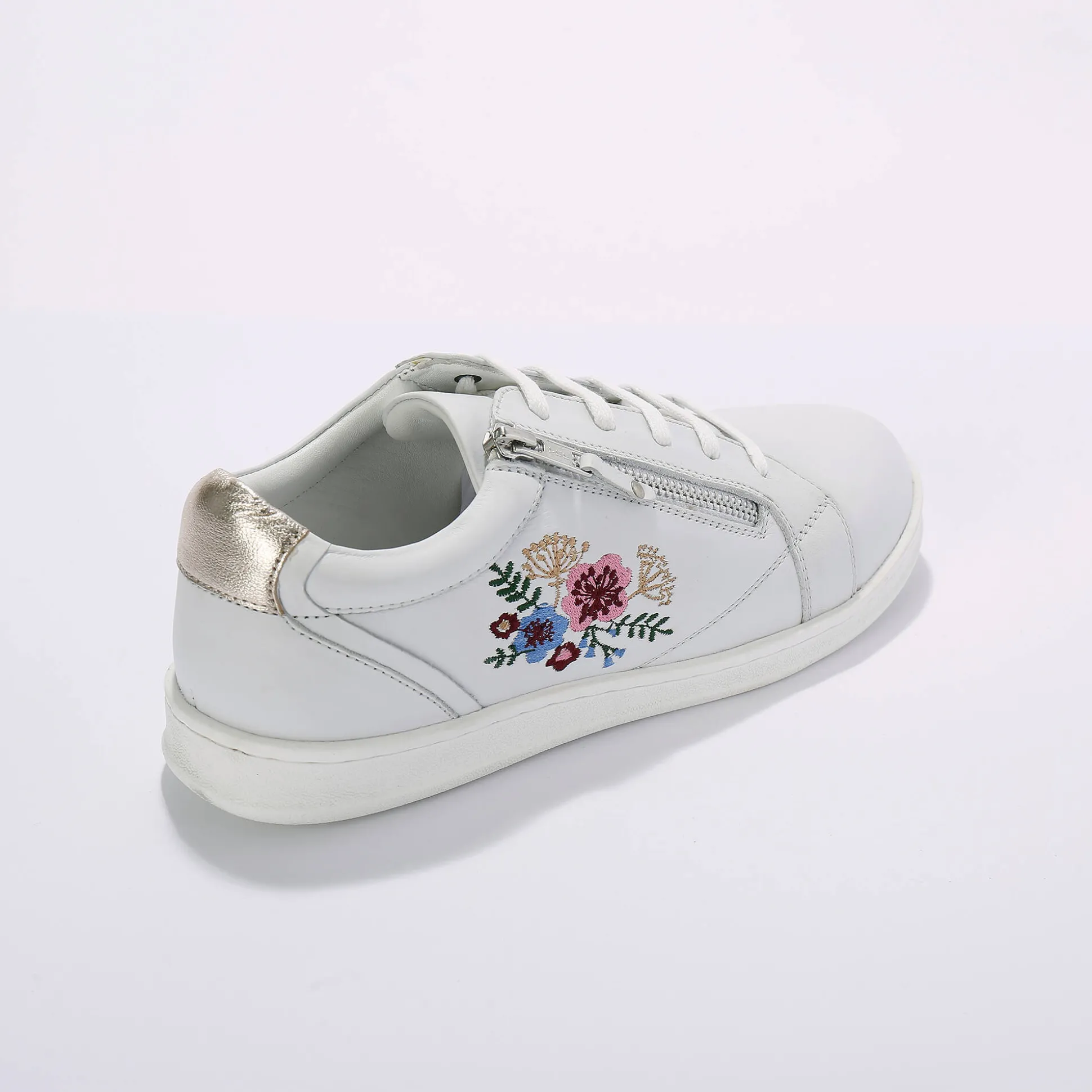 Leren sneakers met rits en bloemenborduursel