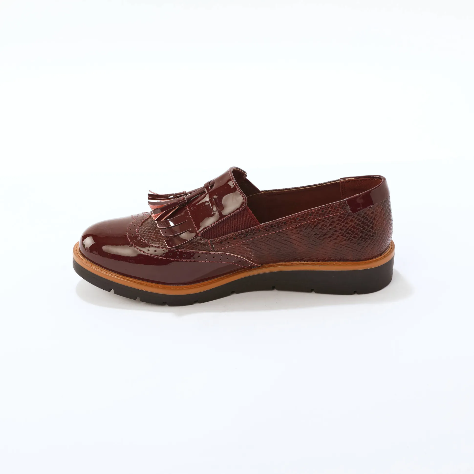 Mocassins met pompons en franjes