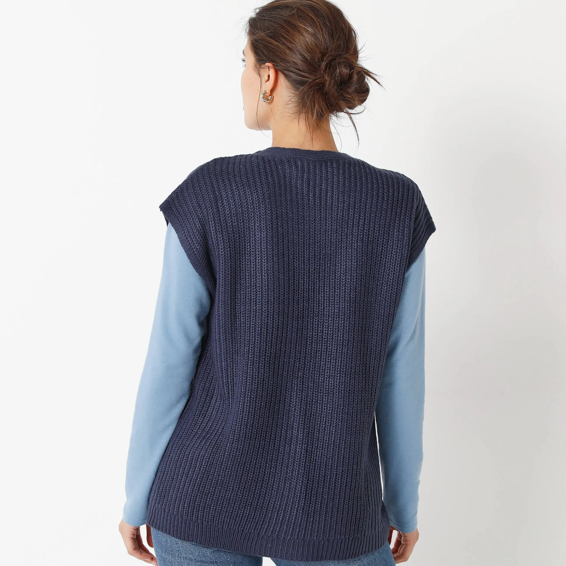 Mouwloos vest met knopen