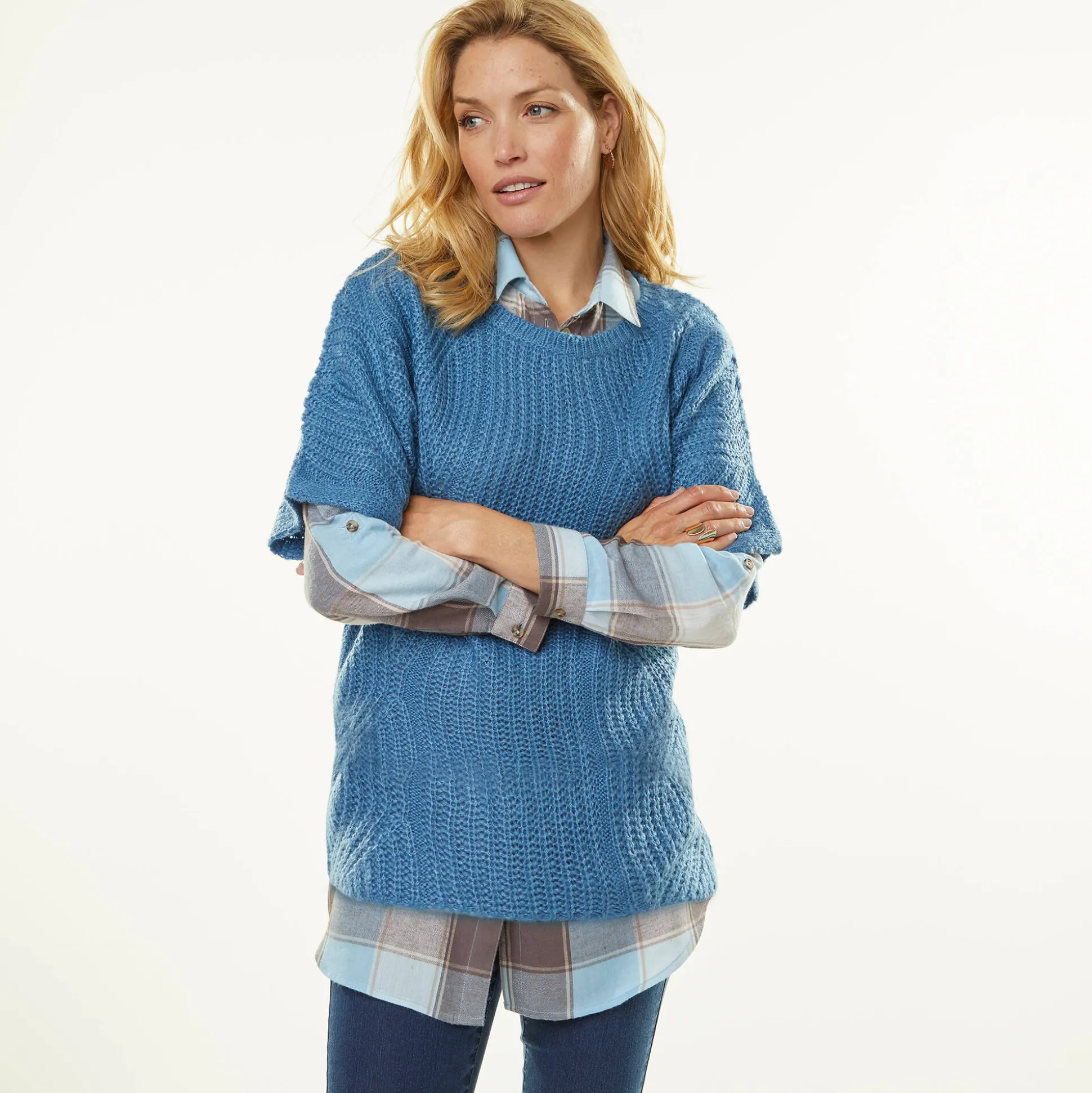 Poncho trui met mouwen op ellebooglengte