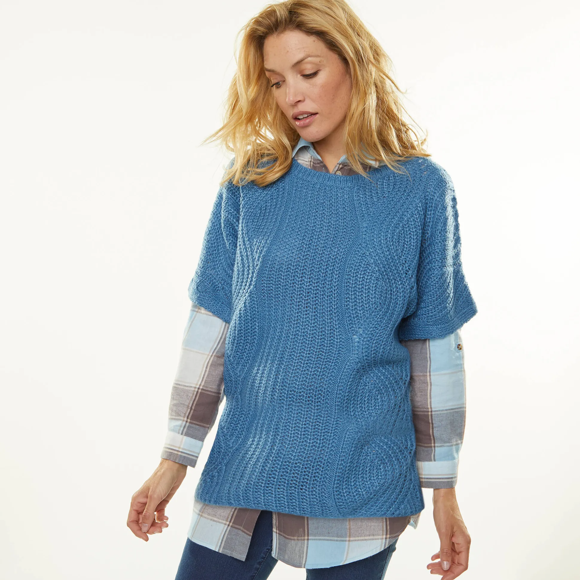 Poncho trui met mouwen op ellebooglengte