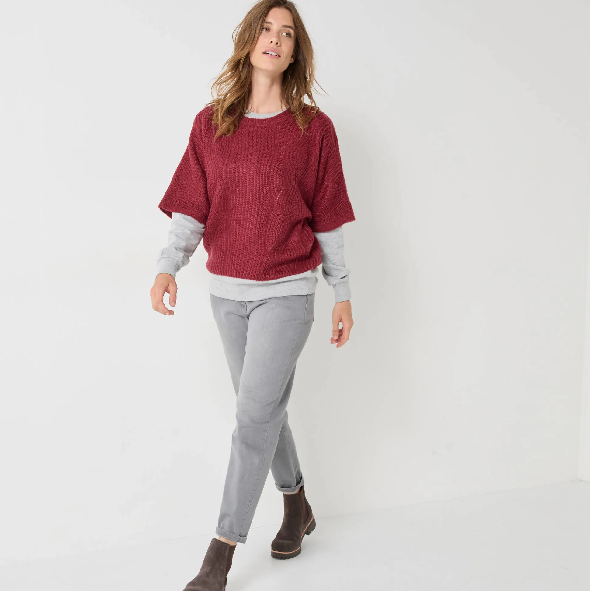 Poncho trui met mouwen op ellebooglengte