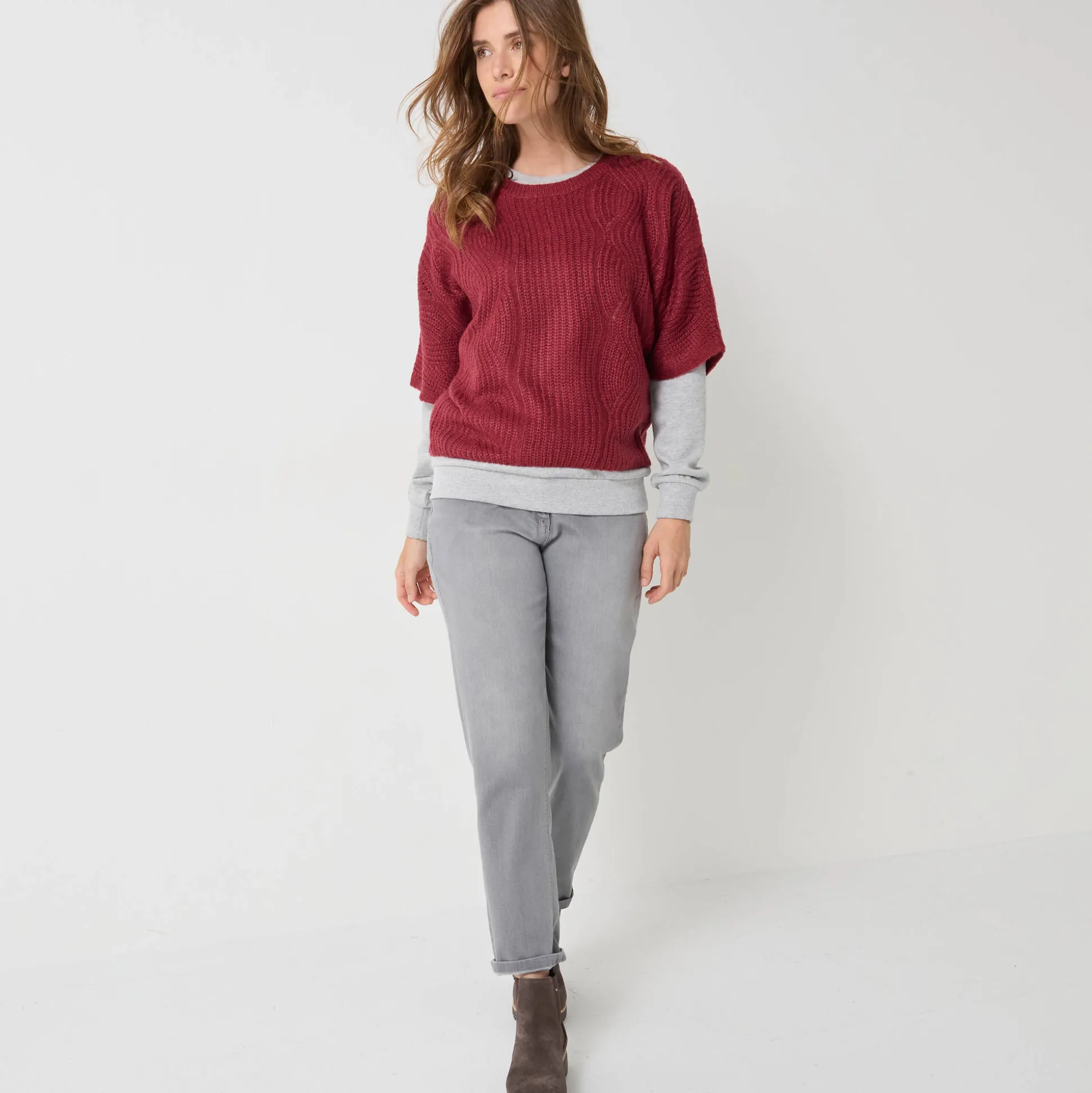 Poncho trui met mouwen op ellebooglengte