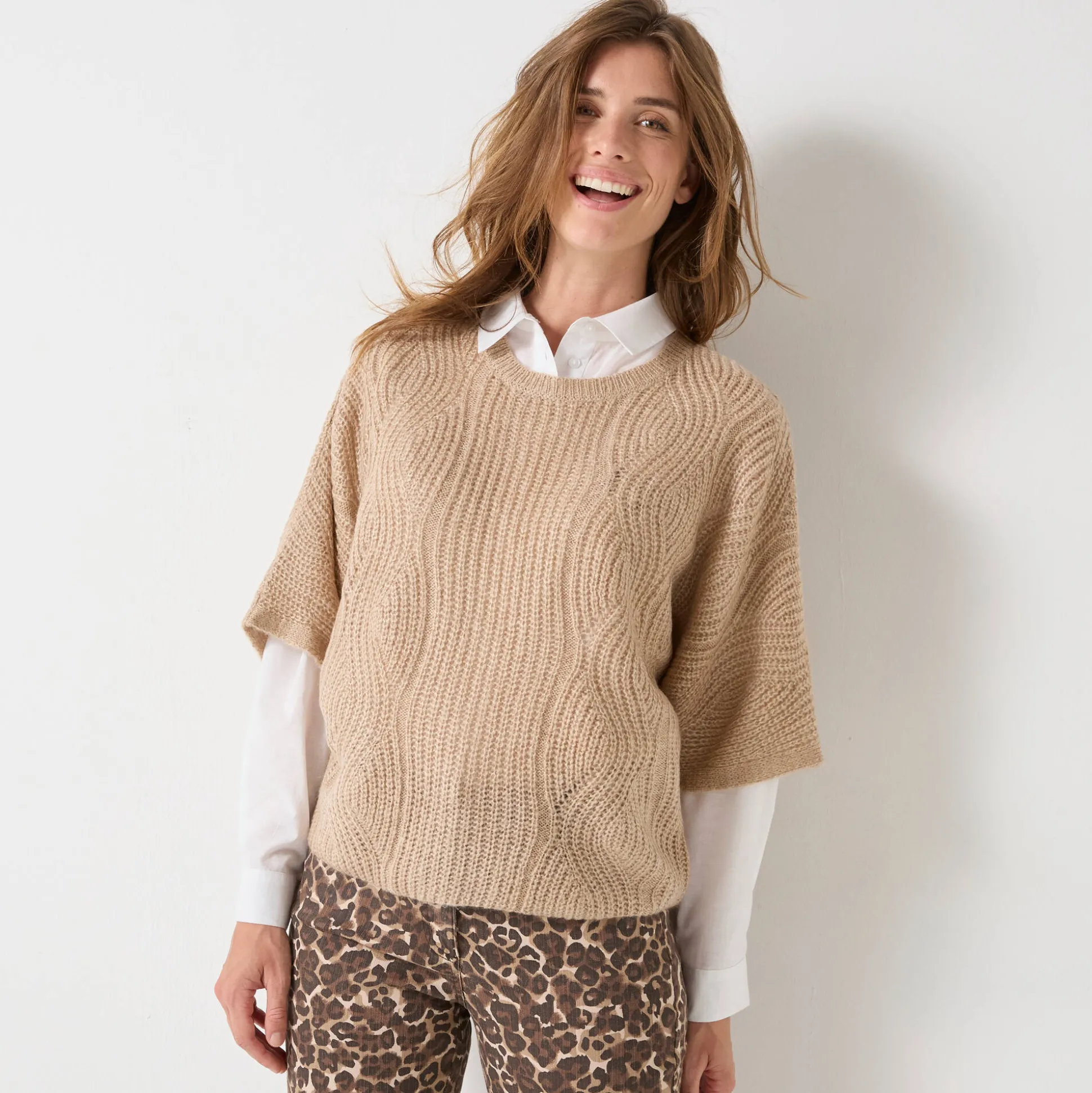 Poncho trui met mouwen op ellebooglengte