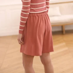 Shortrokje in wikkelstijl met knoopsluiting