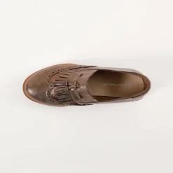 Slip-ons met sleehak, franjes en kwastjes