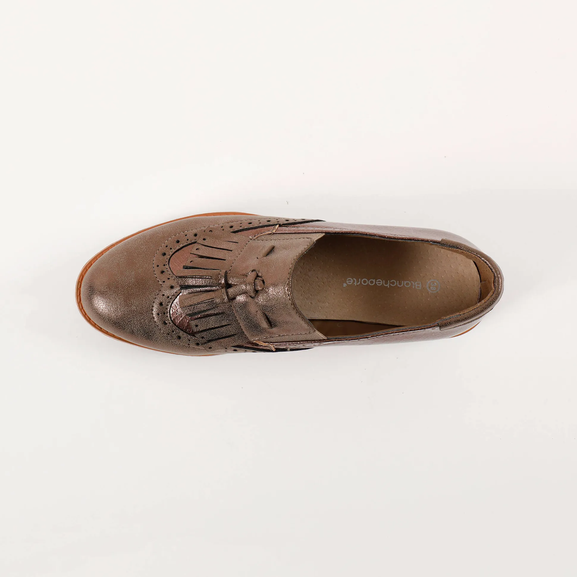 Slip-ons met sleehak, franjes en kwastjes
